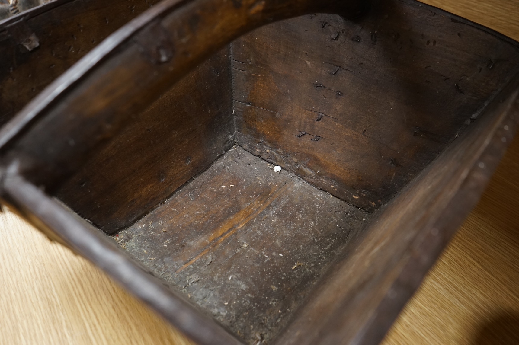 A 19th century Chinese hardwood painted rice carrier, 39cm square, 33cm high.
